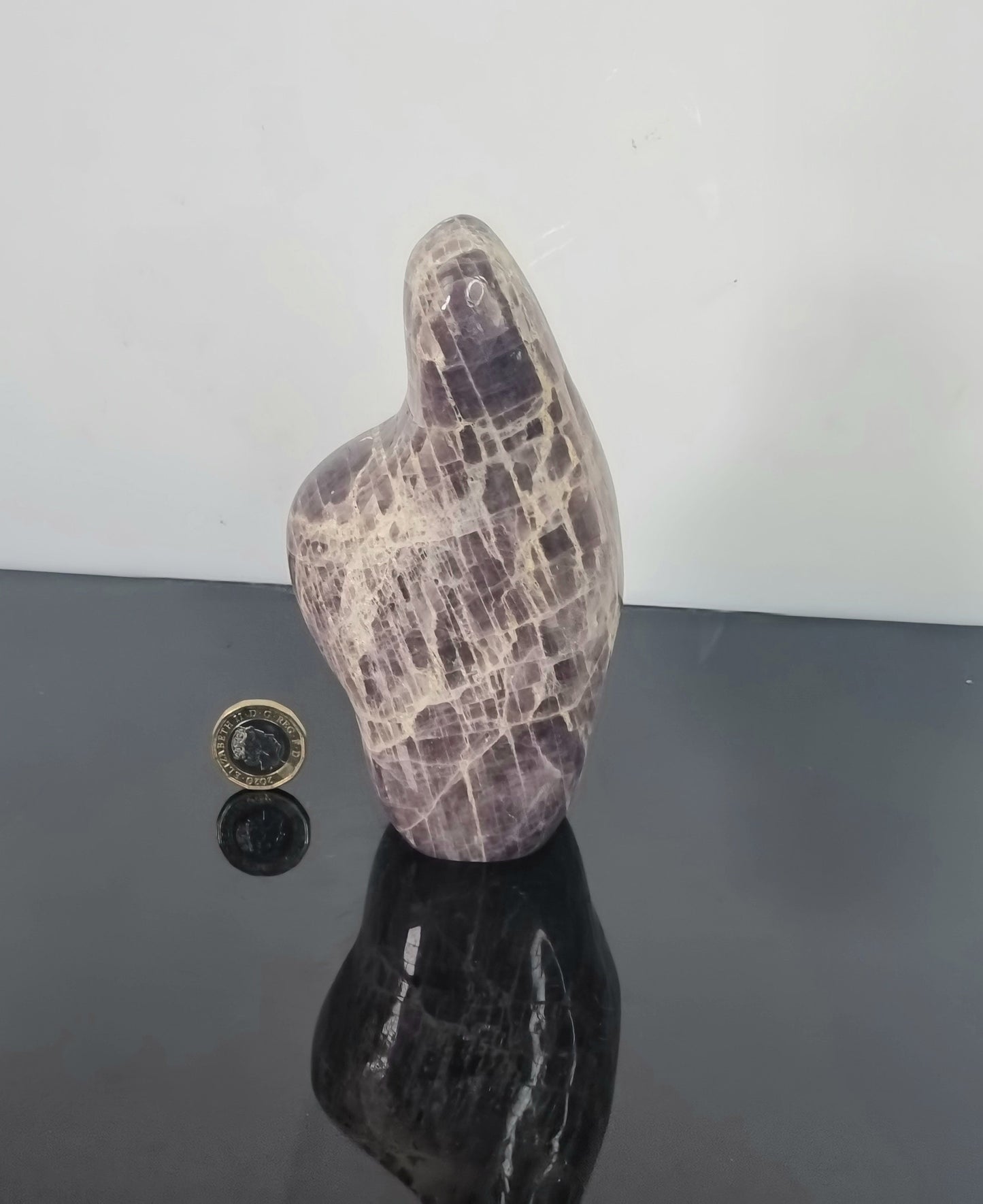 A beautiful large freestanding Anhydrite crystal. Handcrafted and polished by artisans in Madagascar.