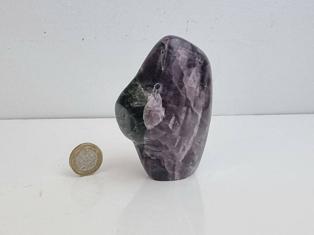 A beautiful large freestanding Anhydrite crystal. Handcrafted and polished by artisans in Madagascar.