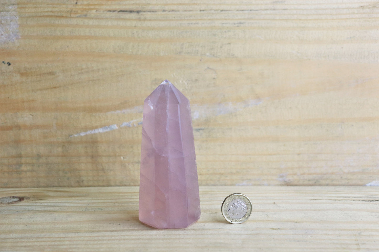 small rose quartz crystal tower