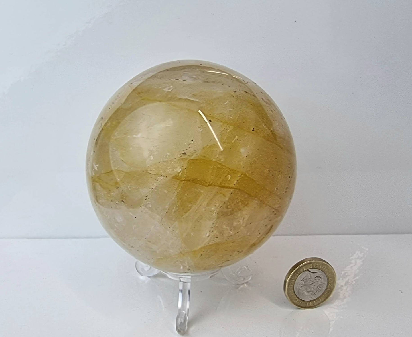 6) Golden Healer Quartz Crystal Sphere