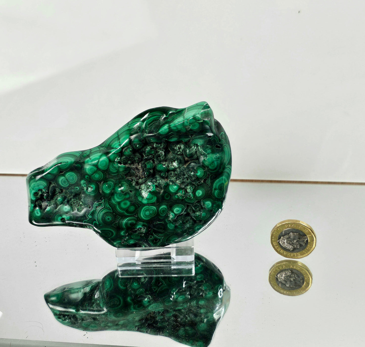 large polished malachite crystal