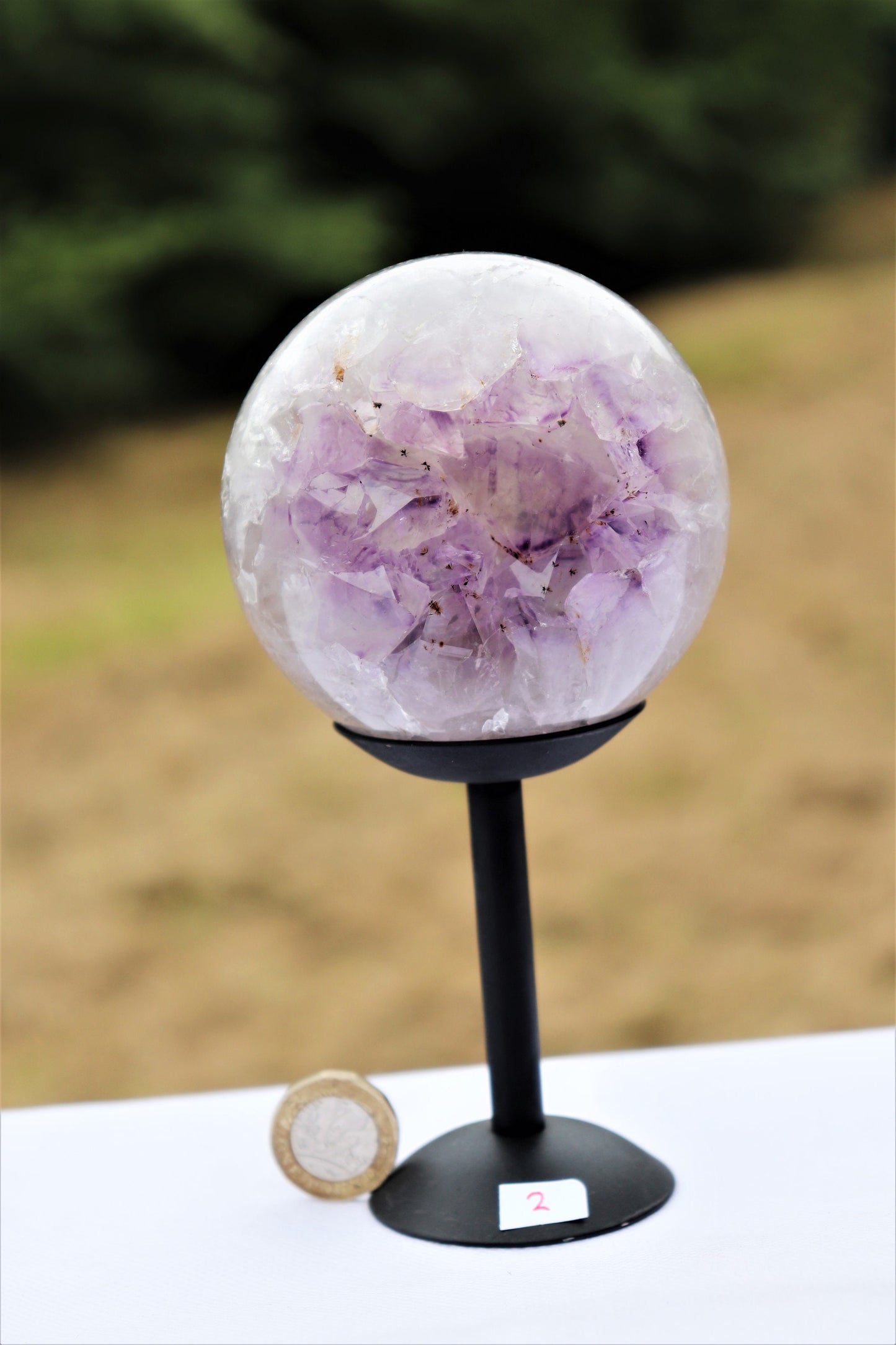 large amethyst crystal sphere
