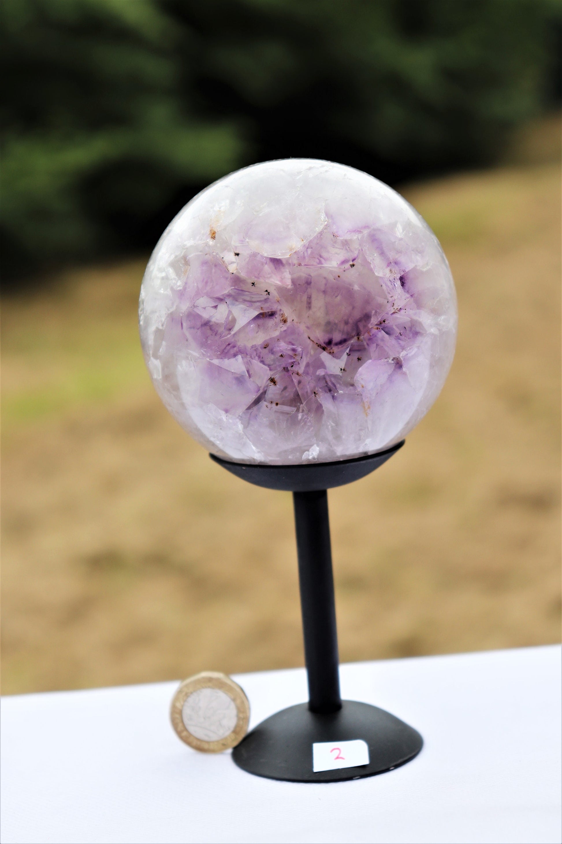 large amethyst crystal sphere