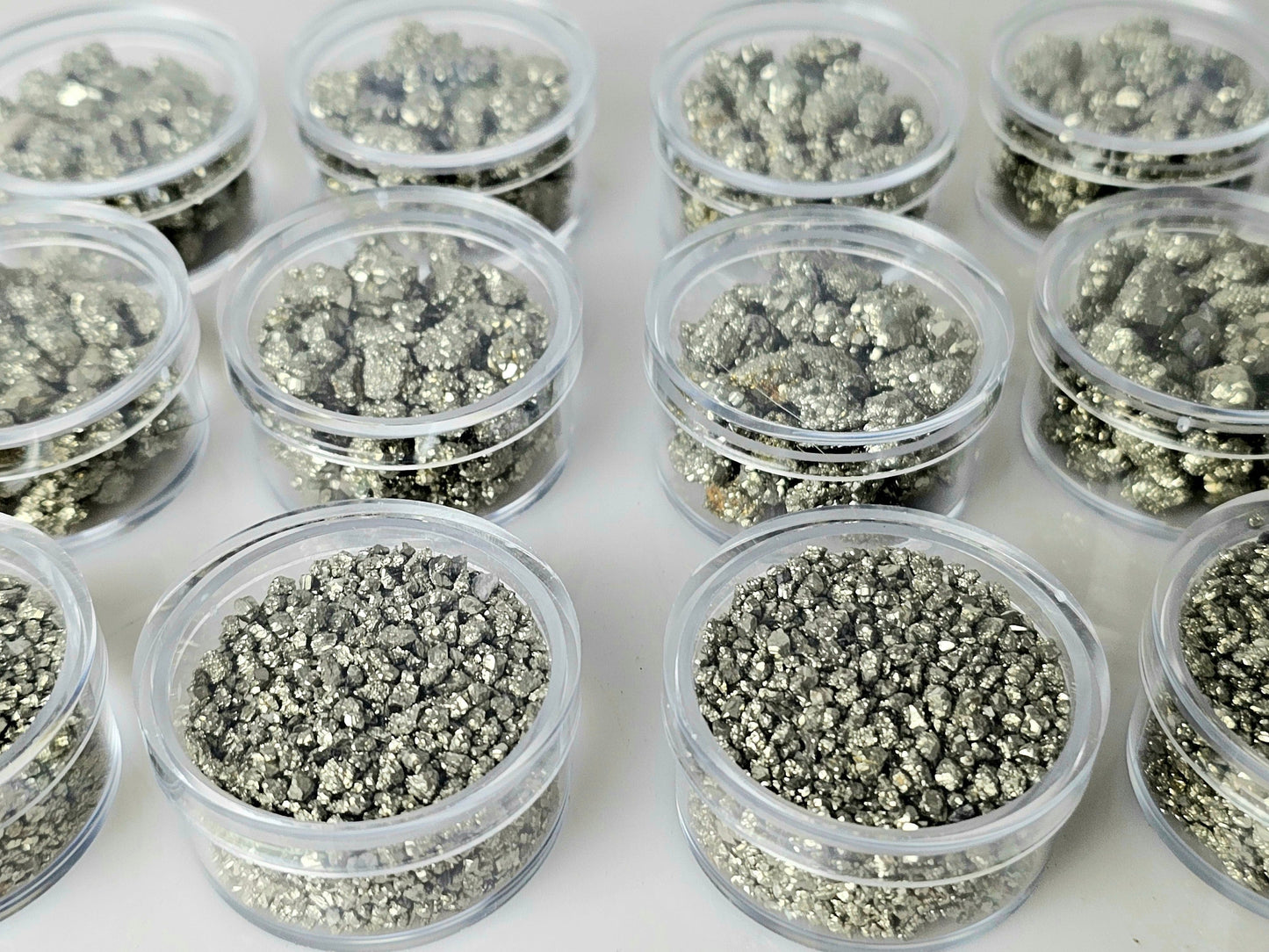 Pyrite crystals in display case