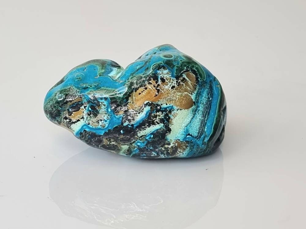 3) large chrysocolla crystal polished