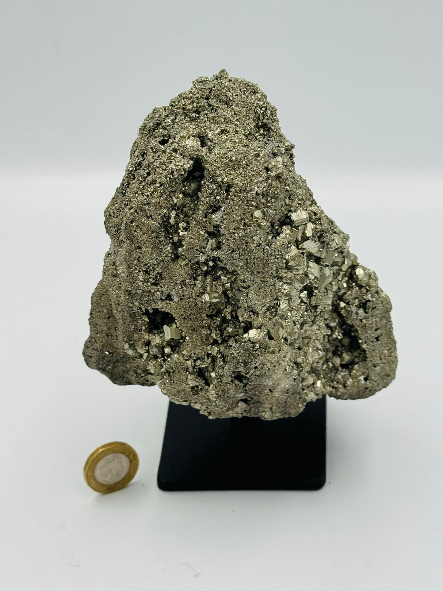 big pyrite on display stand