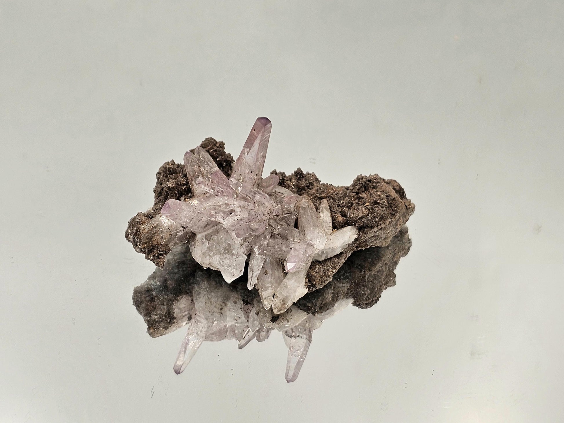 Polished Veracruz amethyst crystal with light violet color and transparency