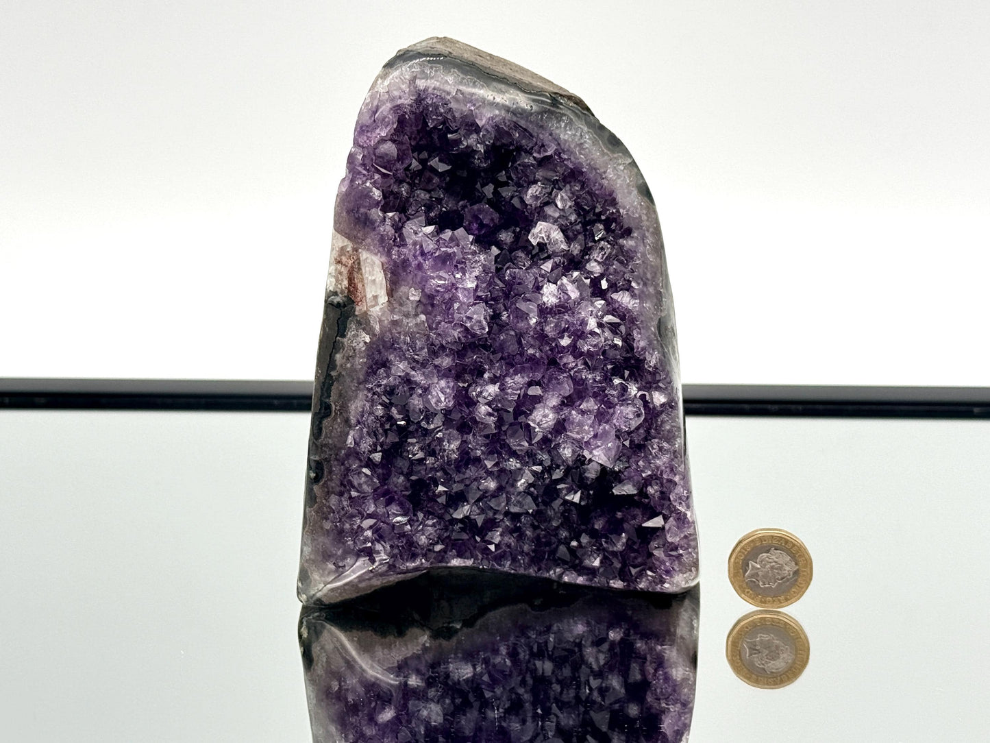 Large Uruguayan Amethyst Crystal Geode (AMU28) showcasing vibrant purple hues and natural crystal formations.