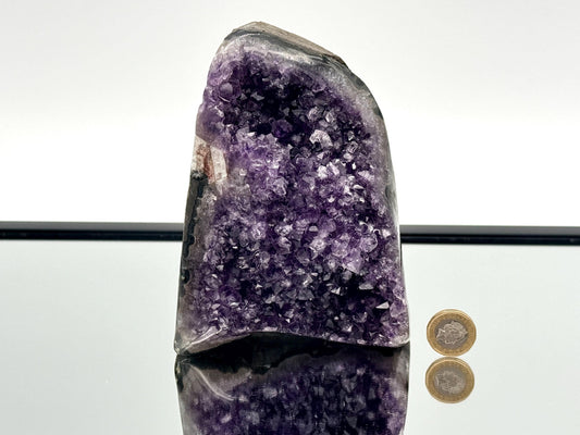 Large Uruguayan Amethyst Crystal Geode (AMU28) showcasing vibrant purple hues and natural crystal formations.