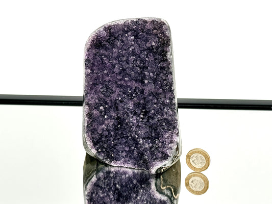Large Uruguayan Amethyst Crystal Geode showcasing beautiful violet hues and polished edges.