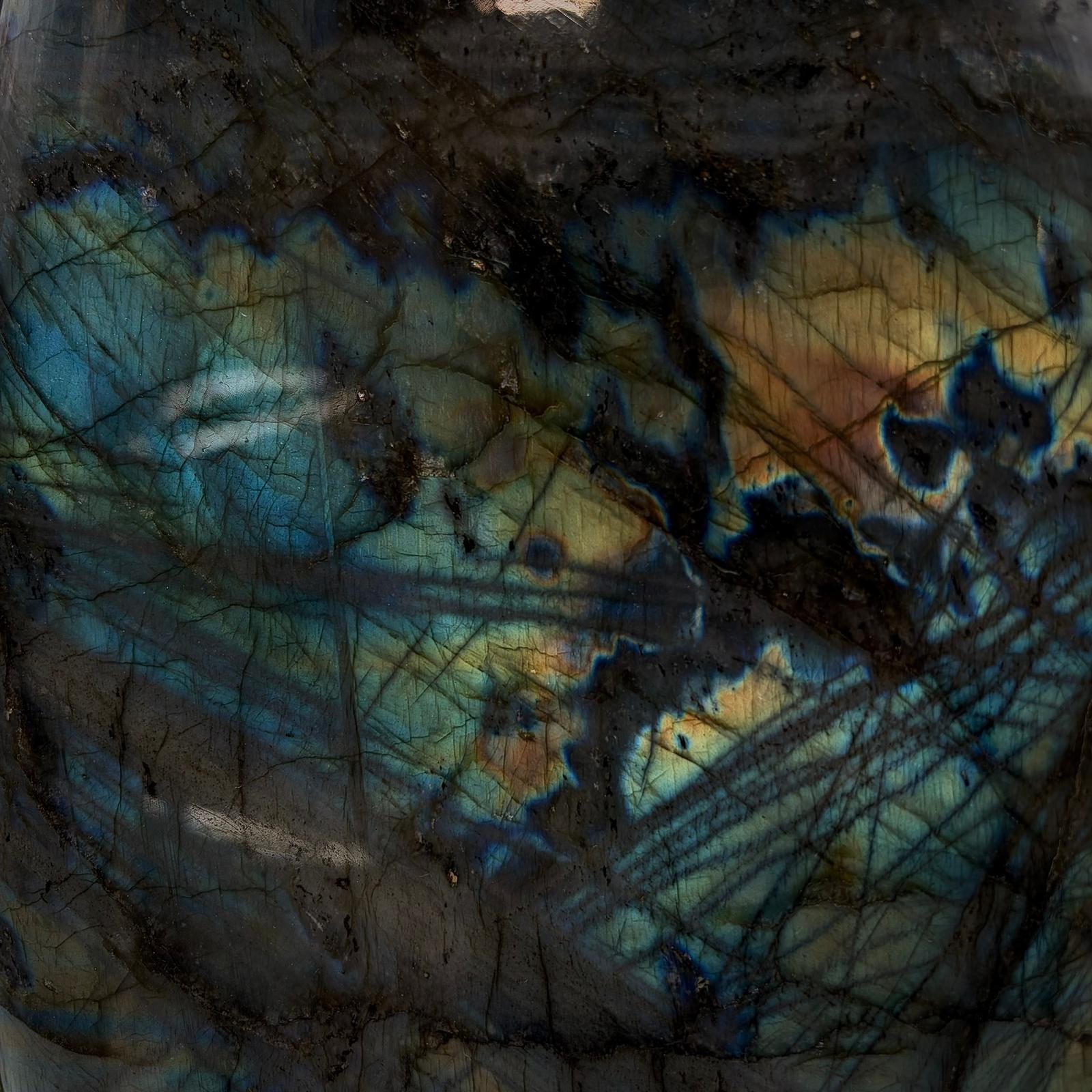 Large Madagascan labradorite crystal for statement home decor, shelves and interior styling.
