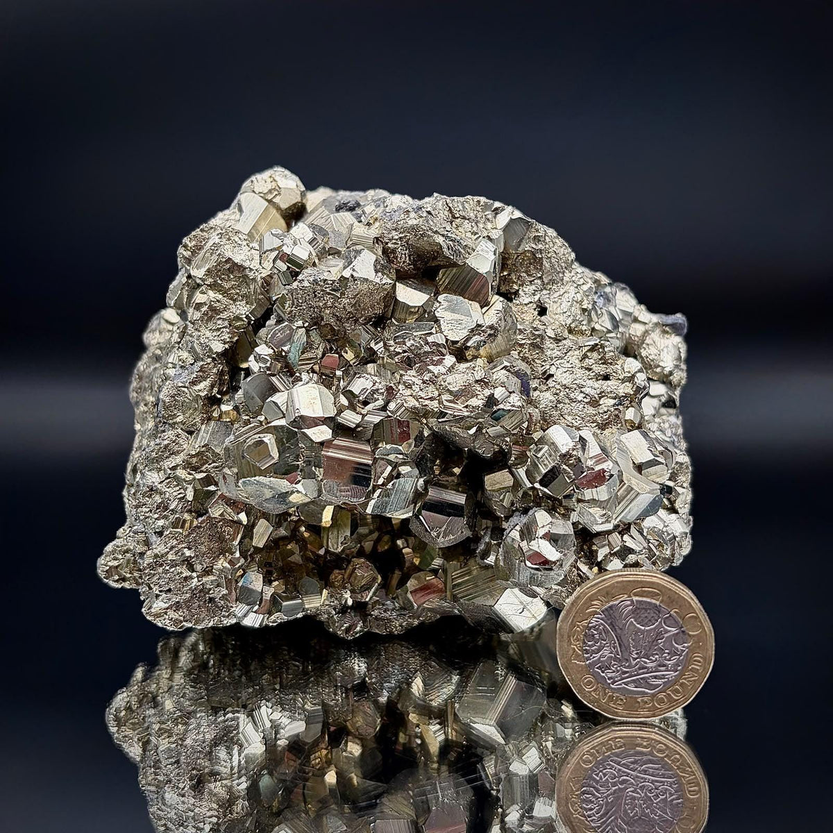 Detailed photograph highlighting the natural crystalline structure and character of this selected Pyrite specimen.