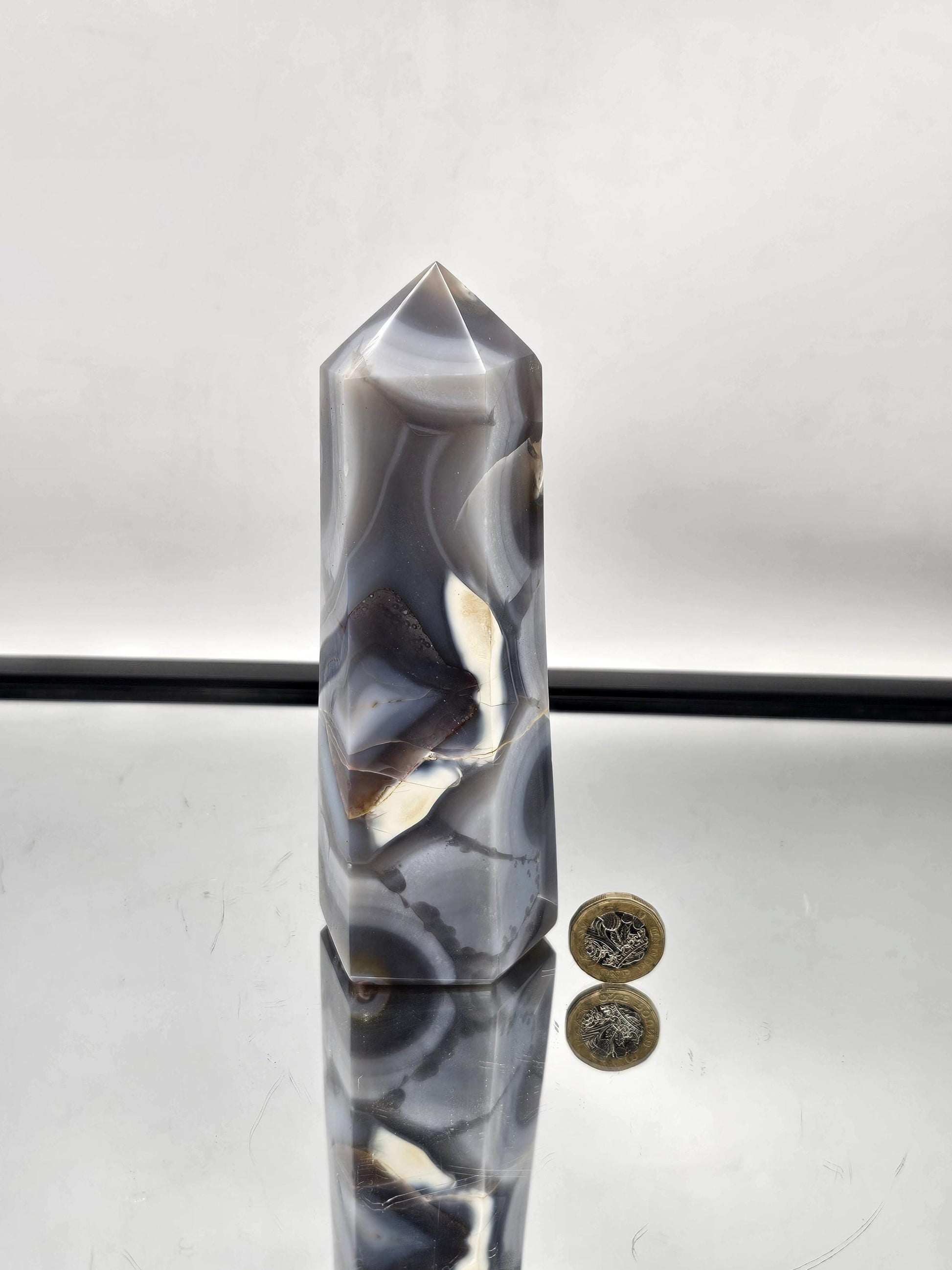 Natural Orca Agate polished crystal tower for decor and meditation.