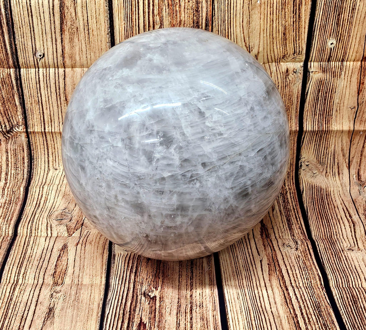 Close-up of a giant 128kg quartz crystal sphere from Madagascar with stunning clarity
