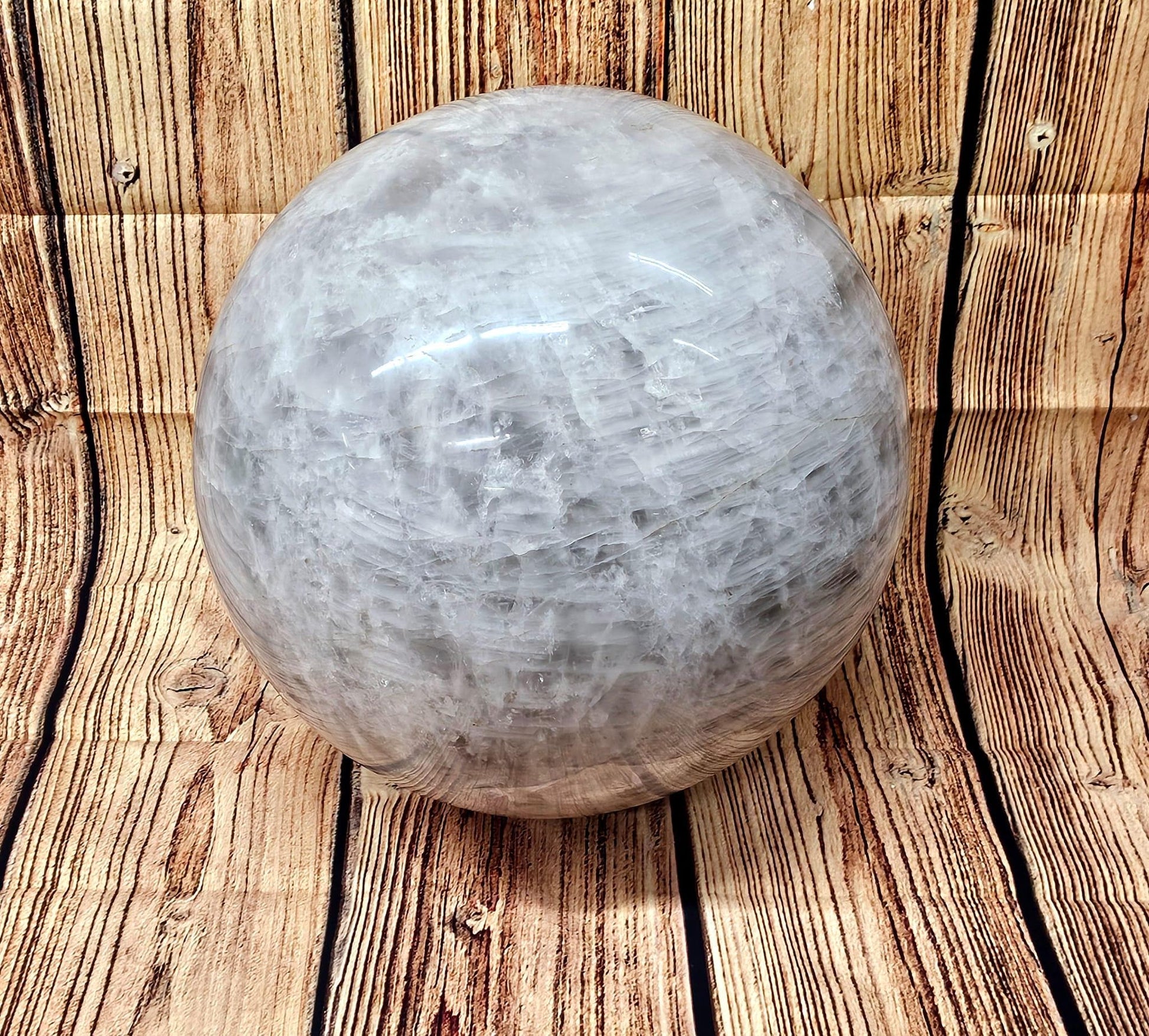 Close-up of a giant 128kg quartz crystal sphere from Madagascar with stunning clarity