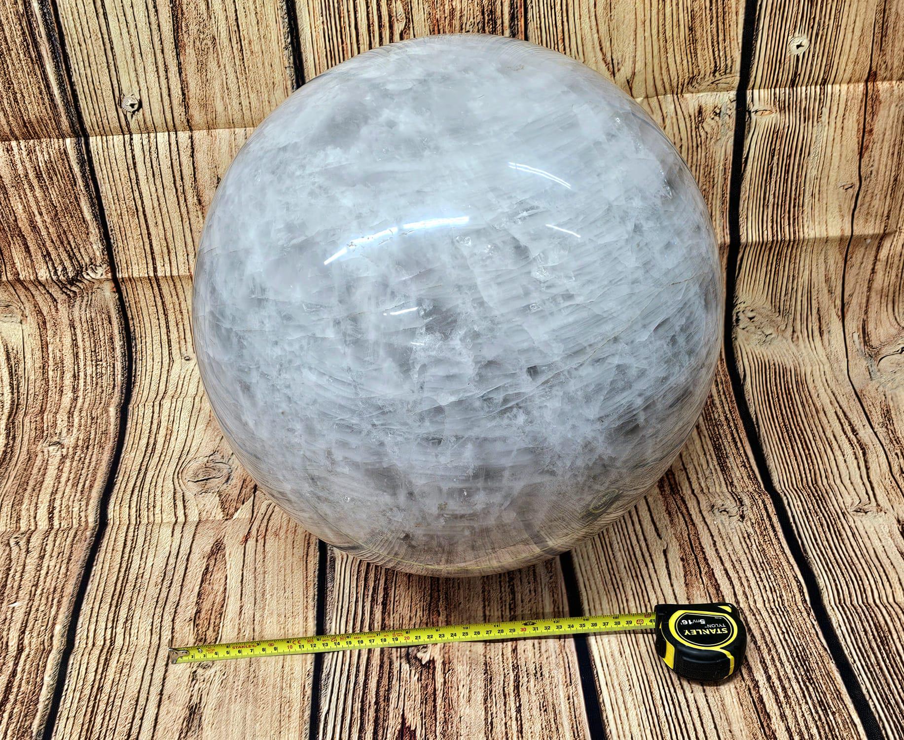 Giant quartz crystal sphere as a timeless art piece for crystal collectors.