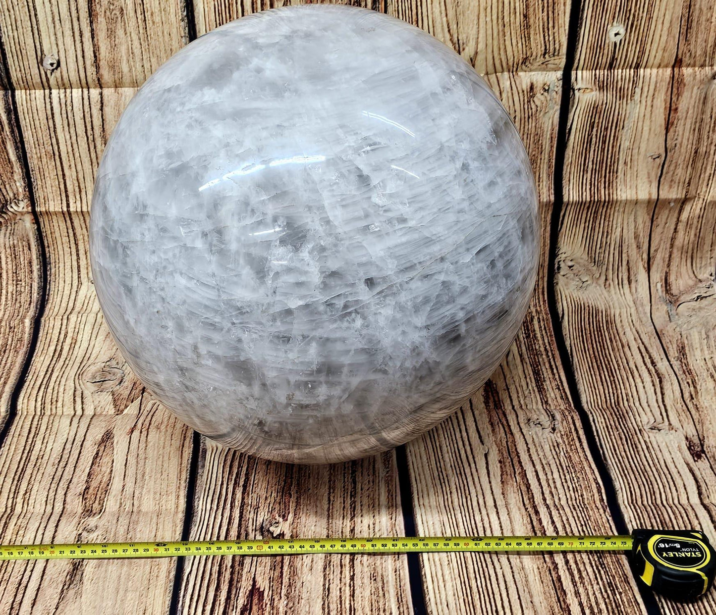 Healing quartz crystal ball radiating energy, perfect for spiritual and meditative use