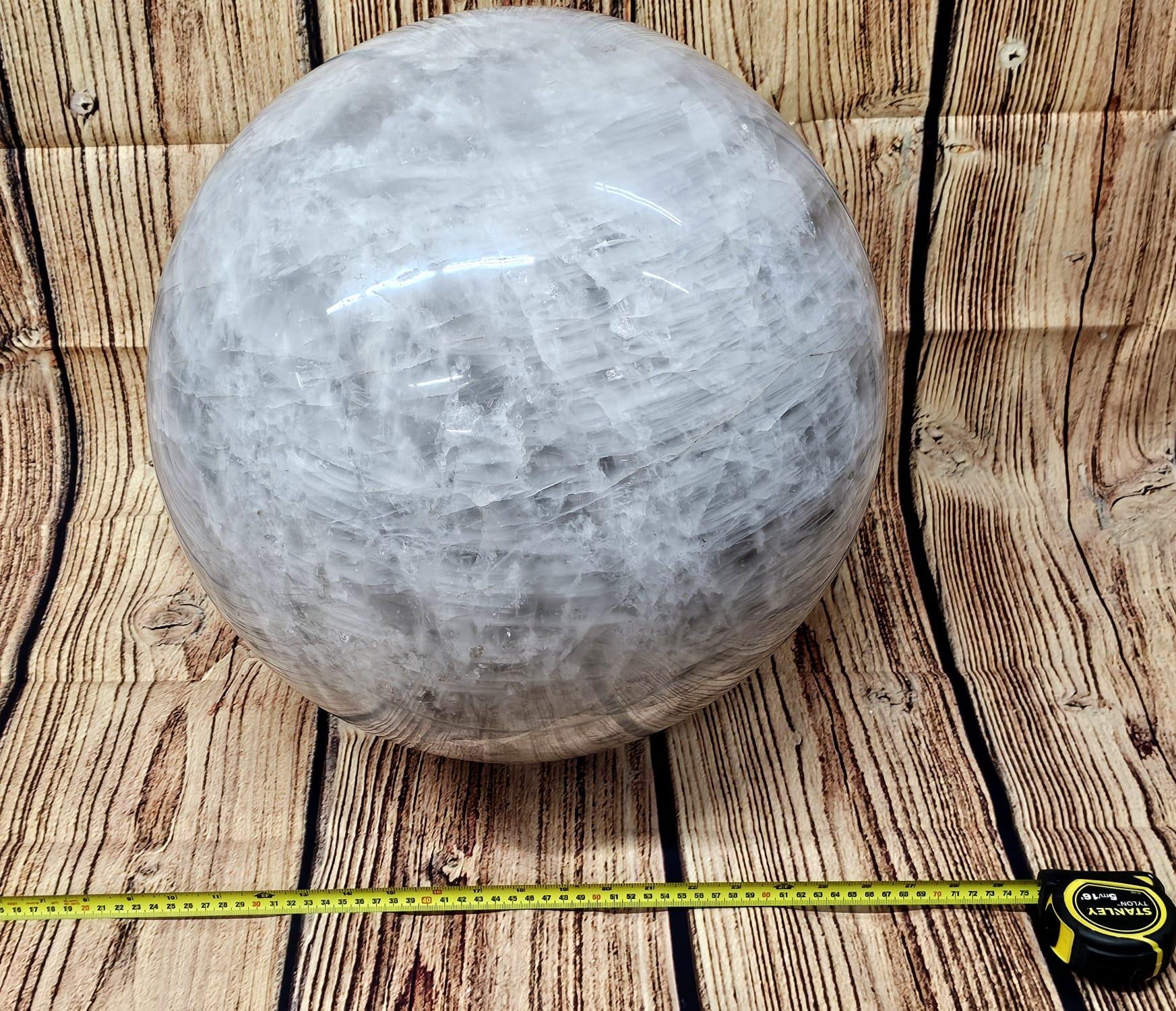 Healing quartz crystal ball radiating energy, perfect for spiritual and meditative use