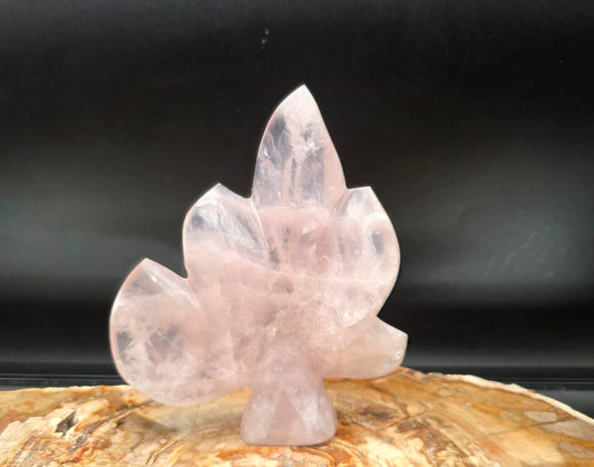Large Rose Quartz leaf sculpture hand carved and polished in Madagascar. One-of-a-kind botanical crystal display for elegant interiors.