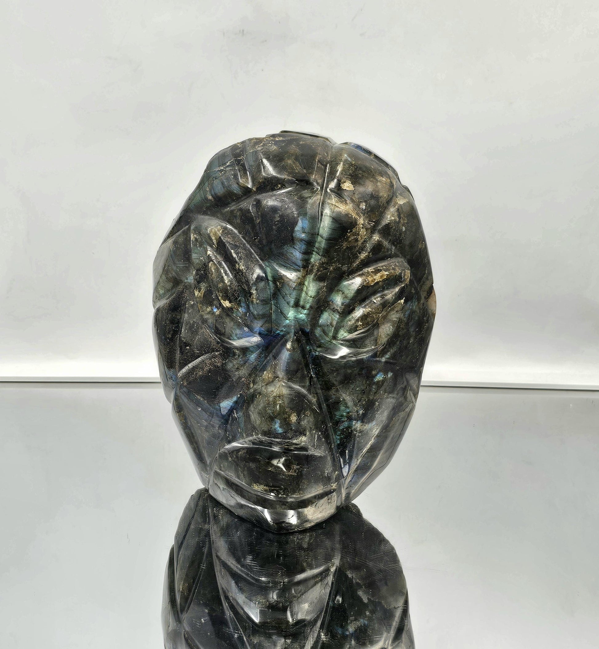 Polished Labradorite face carving with natural Labradorite colors