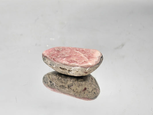 Polished Pink Rhodochrosite Crystal Cabochon
