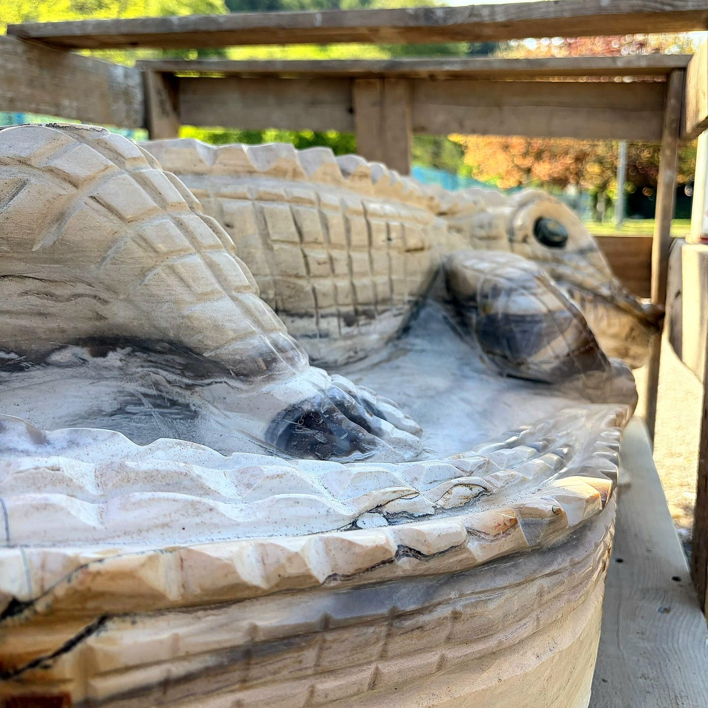 diagonal view of agate crocodile sculpture