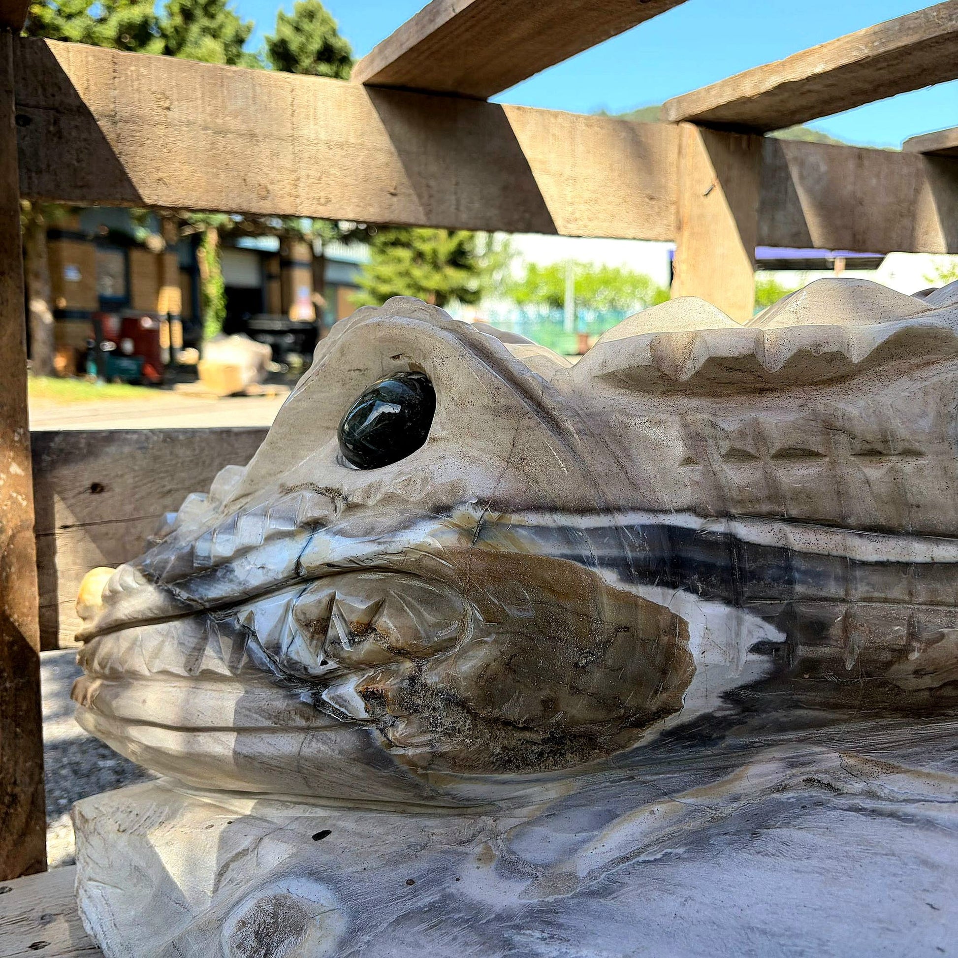 head detail of agate crocodile carving