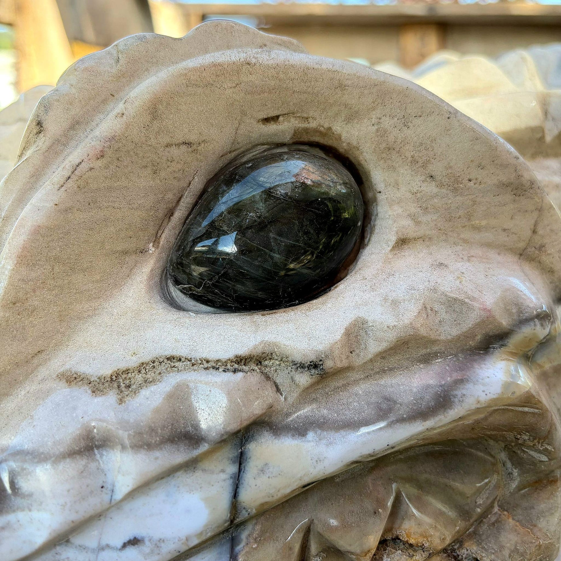 shadow detail on agate crocodile sculpture