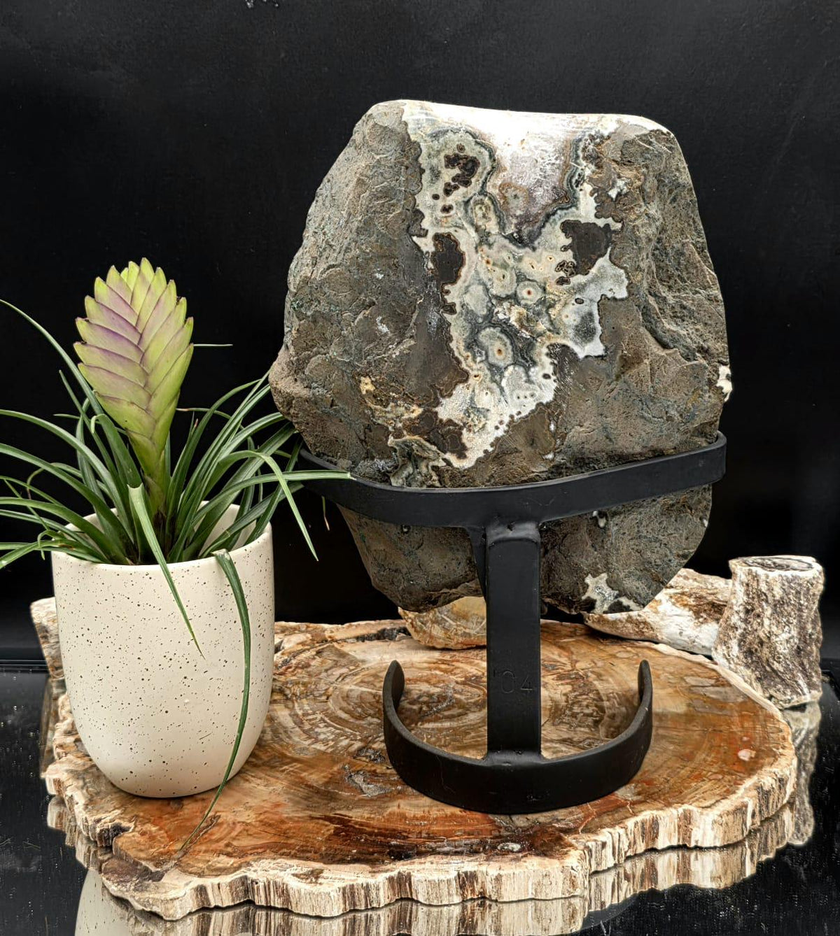Natural Agate and Quartz displayed as a decorative stone sculpture.