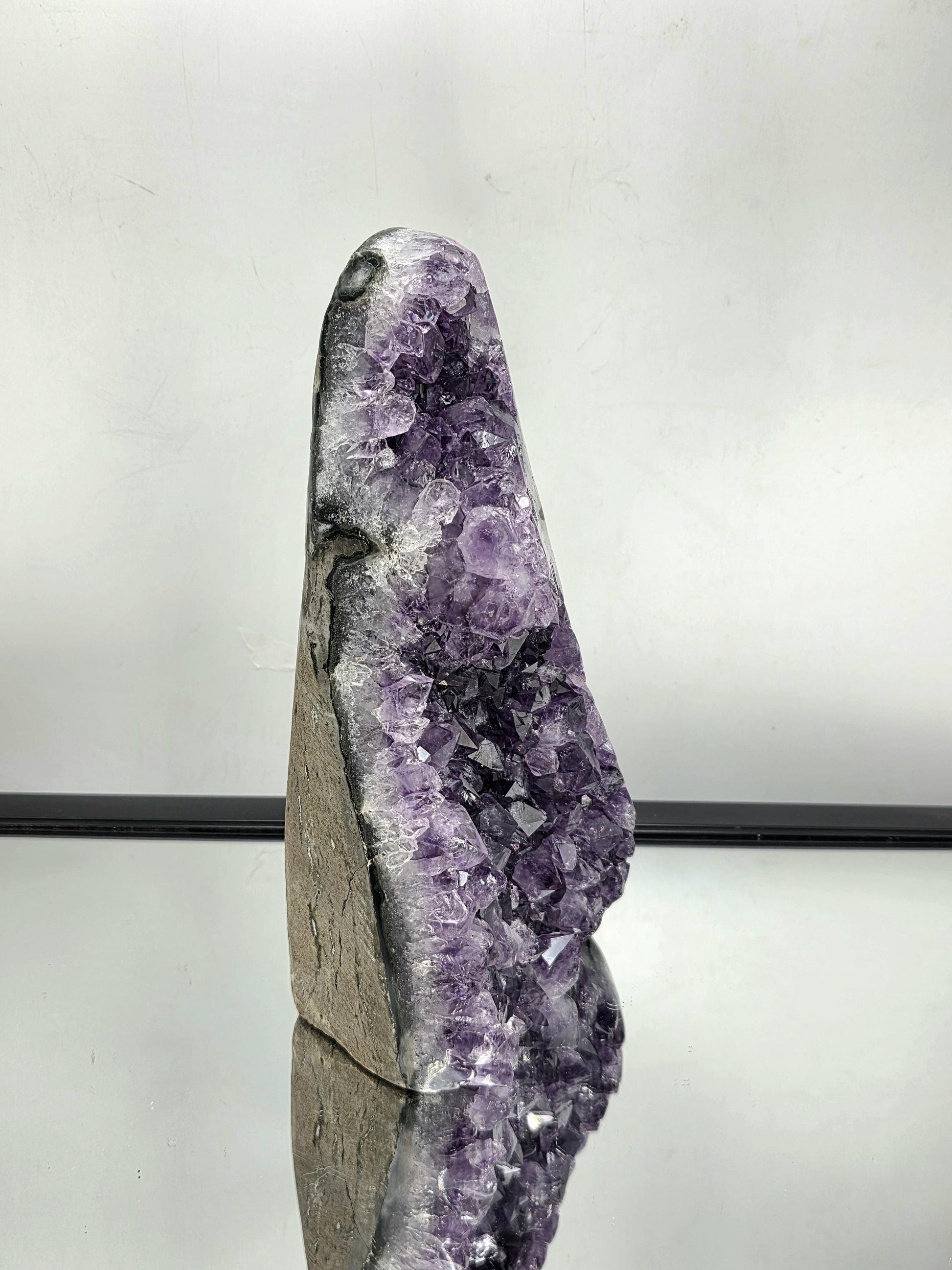 Amethyst crystal art décor styled in elegant interior