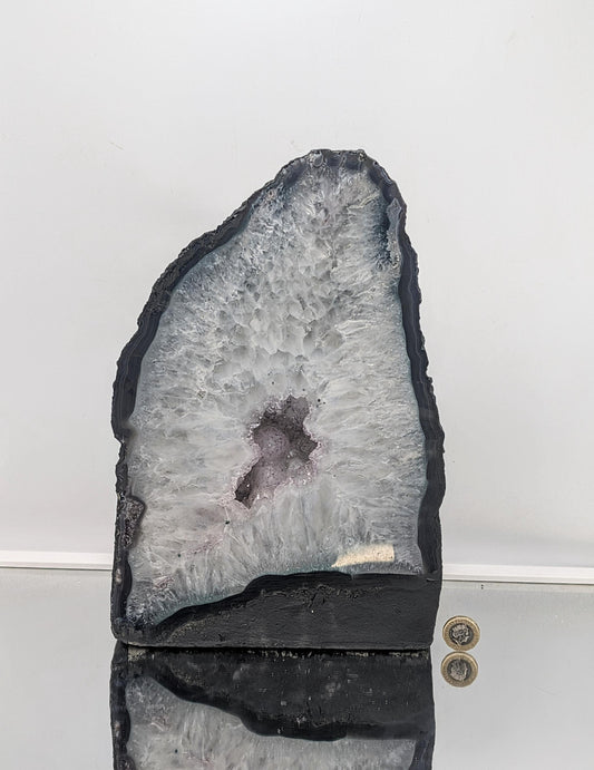 Collectible amethyst church geode with unique color variations