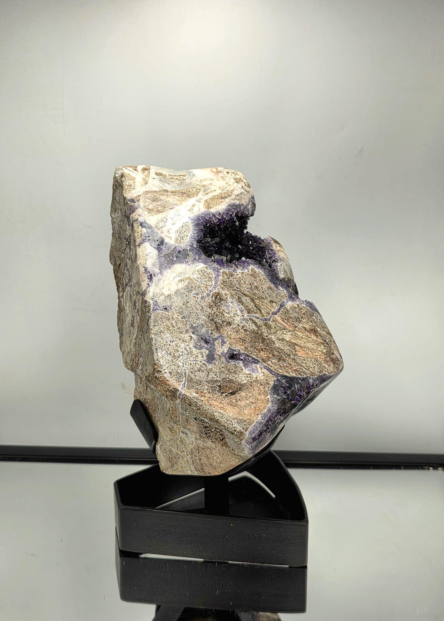 Natural unpolished Amethyst crystal showing raw texture