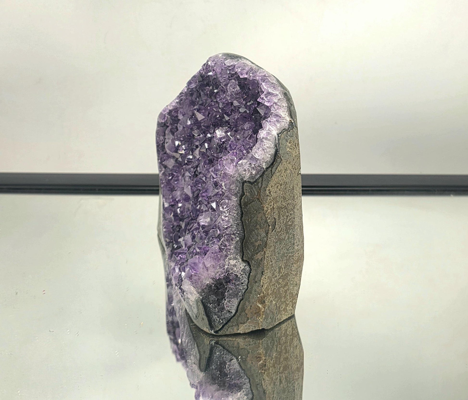 Close up of Uruguayan amethyst crystal points showing vibrant purple color and stunning natural structure.