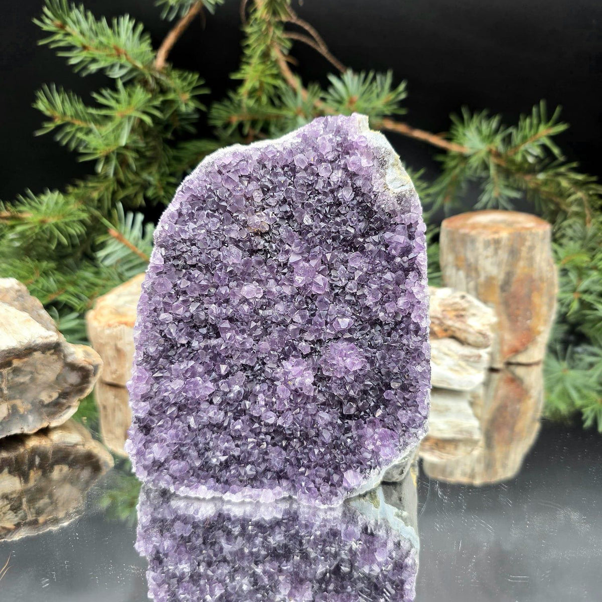 Natural Amethyst mineral specimen from Uruguay in freeform shape.