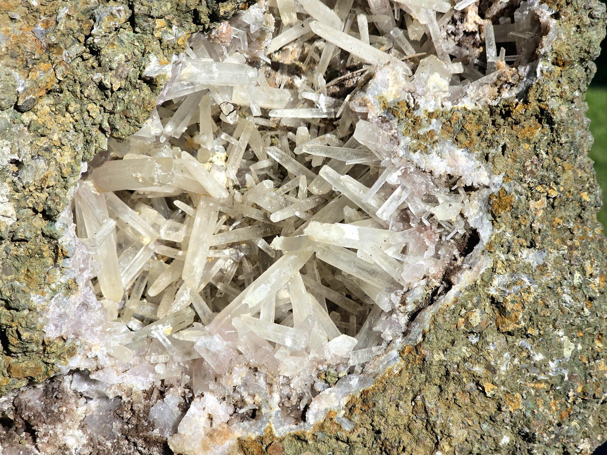 Collector-grade Aragonite geode, admired for its intricate natural structure.