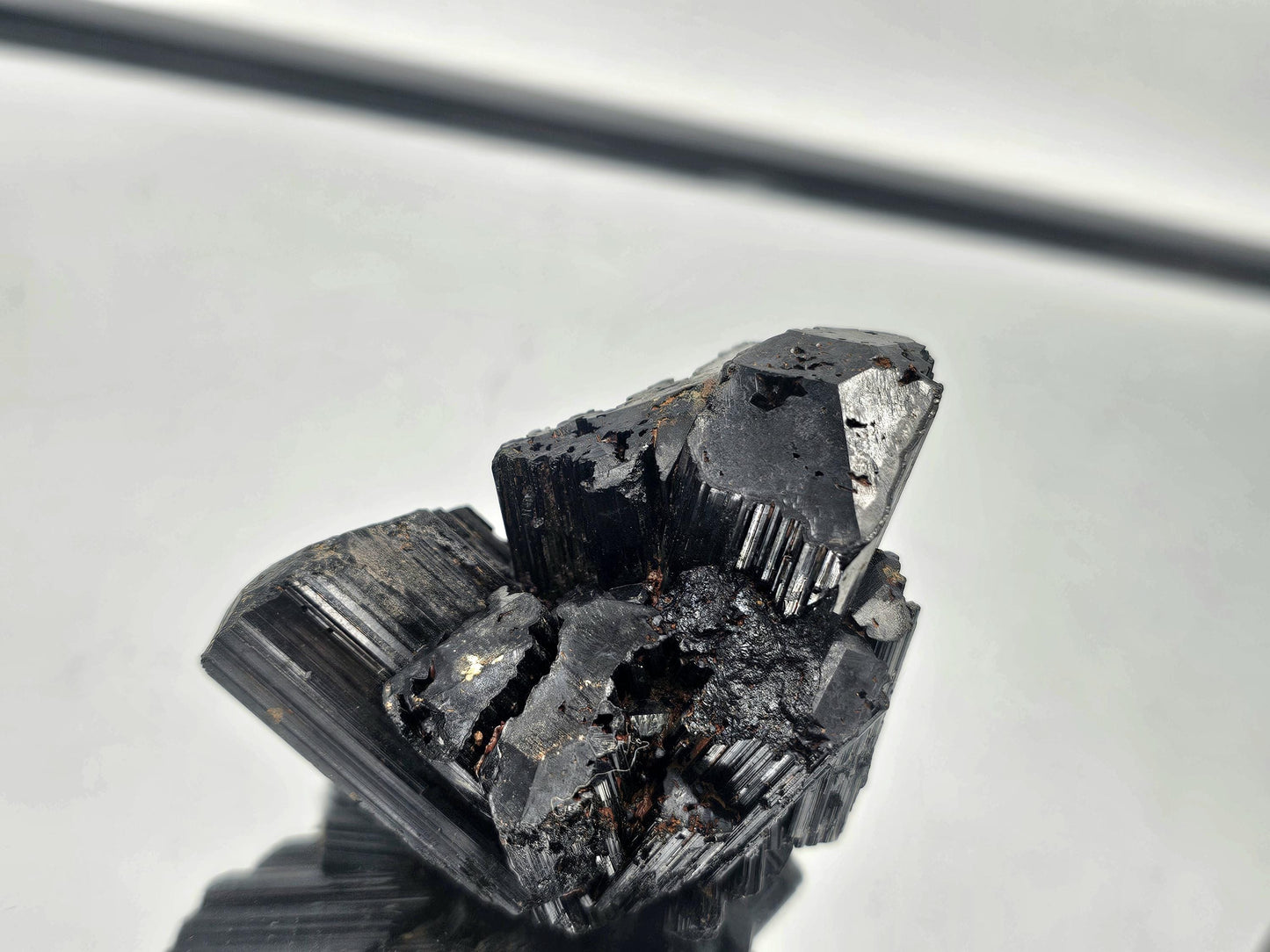 Raw Black Tourmaline crystal with natural termination, part of our curated collection.