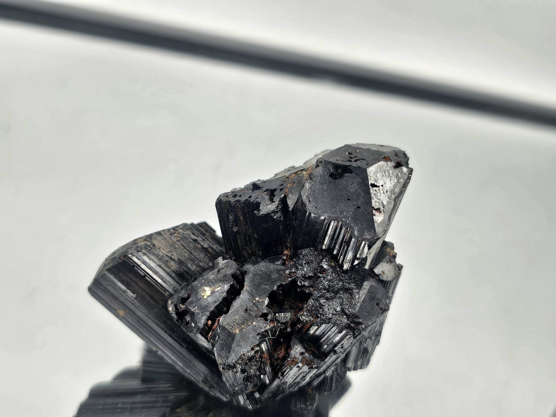 Raw Black Tourmaline crystal with natural termination, part of our curated collection.