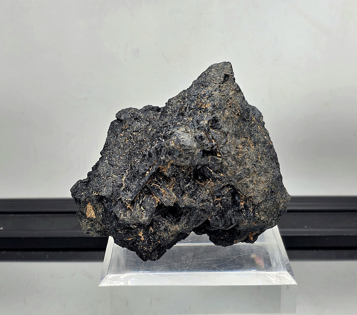 Black tourmaline raw mineral cluster with mica, natural protective crystal.