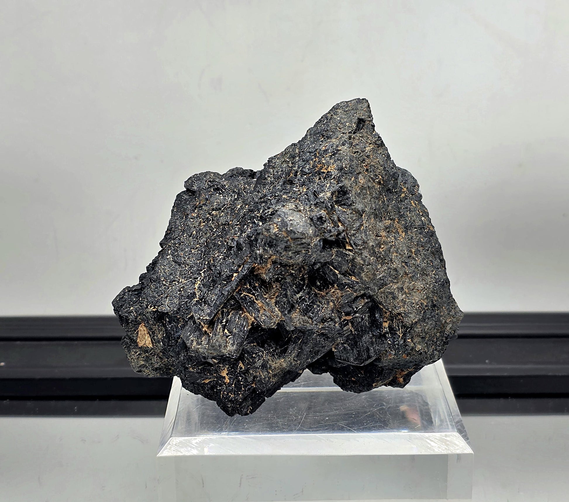 Black tourmaline raw mineral cluster with mica, natural protective crystal.