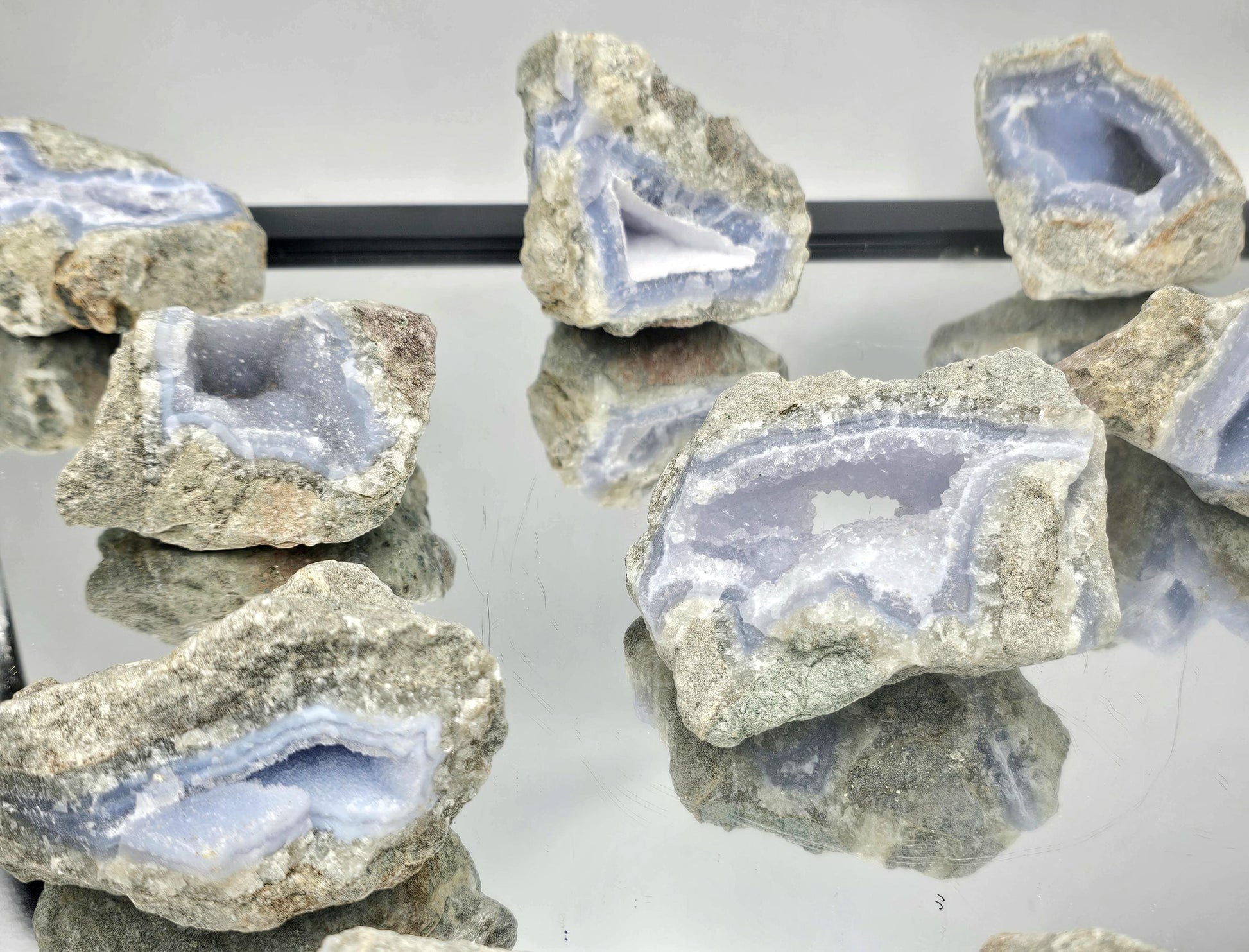 Natural druzy Blue Lace Agate Geode, ideal for unique decor or crystal collections.