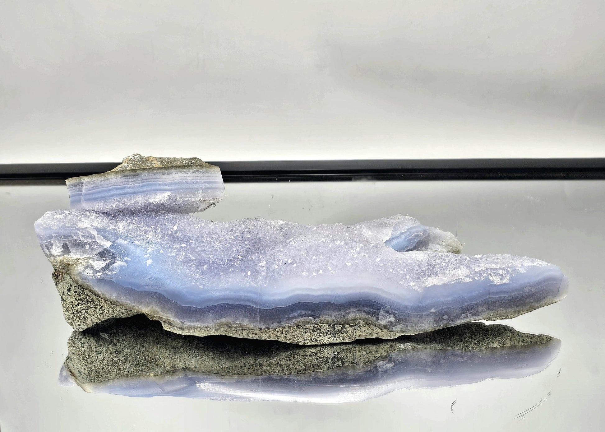 Blue Lace Agate geode with Quartz druzy, perfect for adding a natural touch to home interiors.