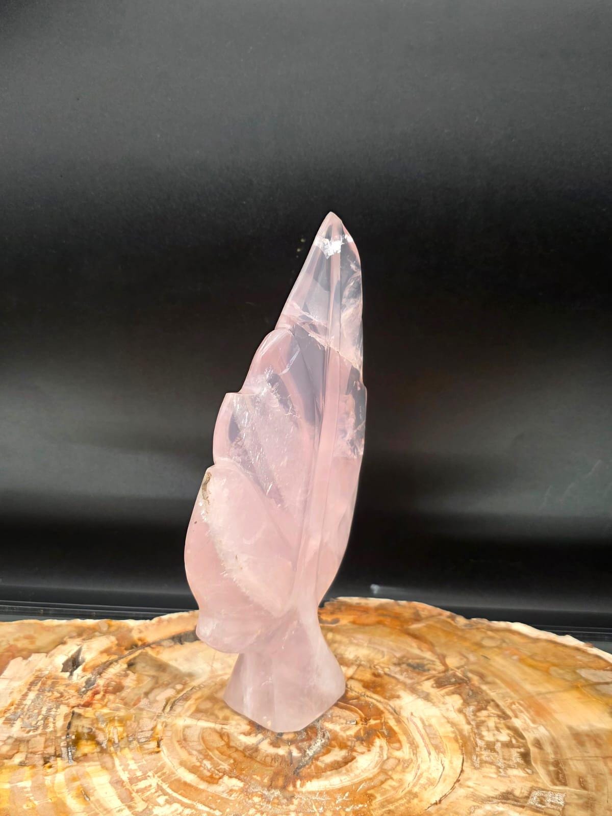 Genuine Rose Quartz botanical ornament with polished finish.