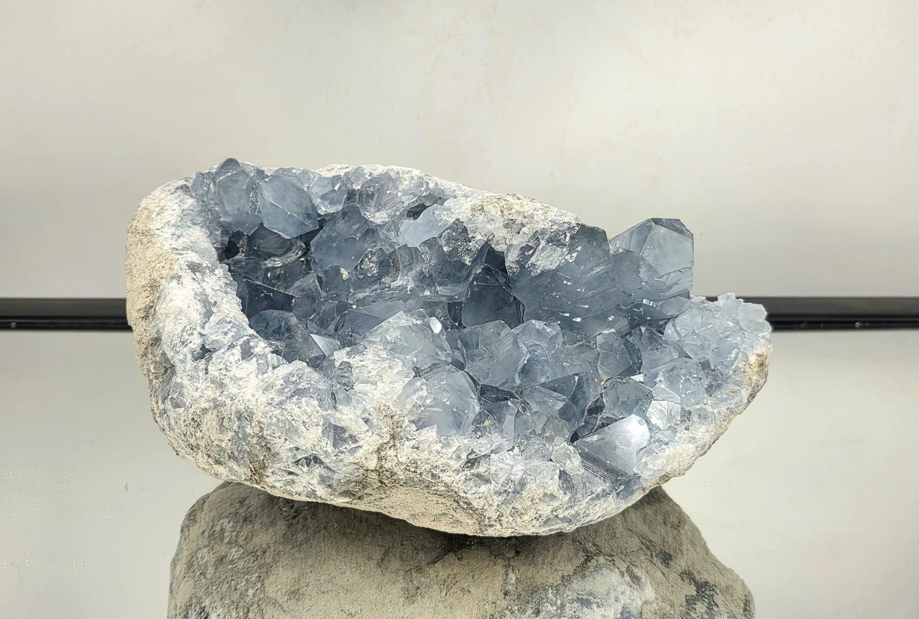 Celestite mineral cluster styled as luxury display piece