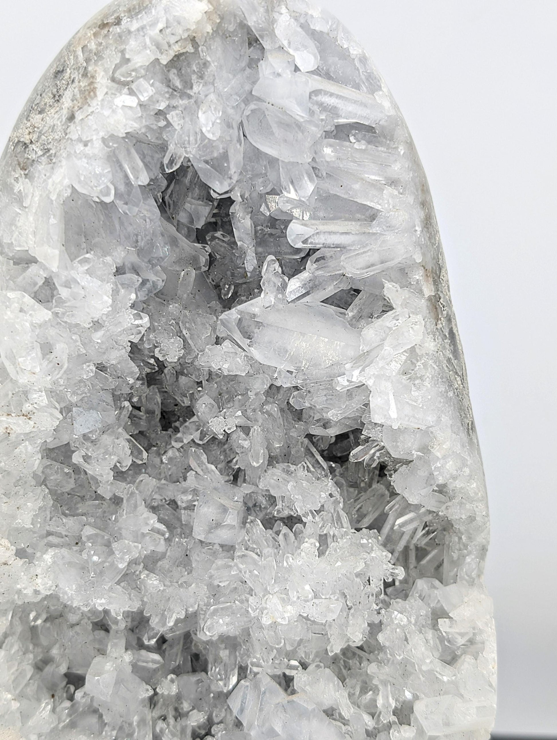 Celestite crystal freeform with stable cut base for display