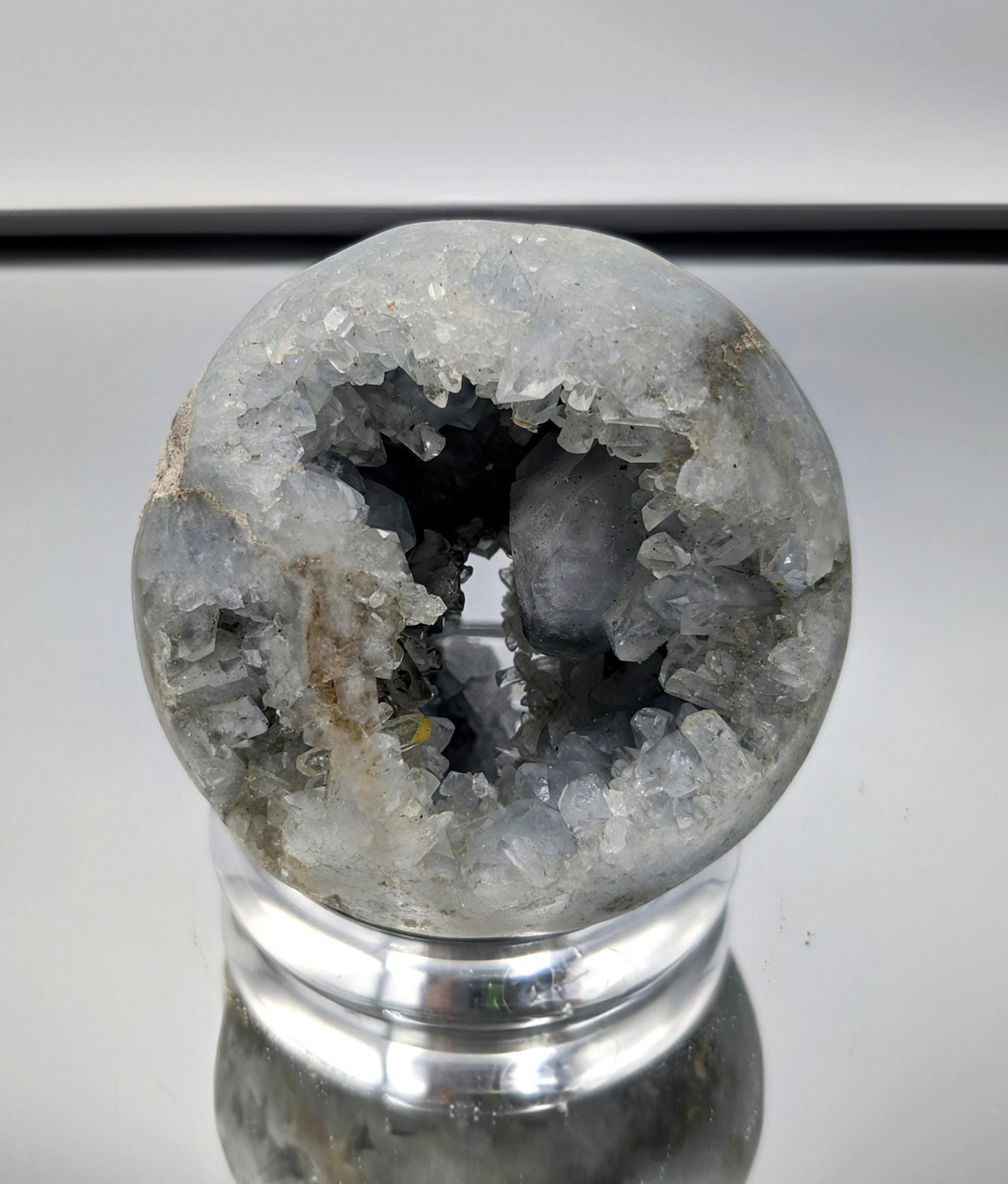 Celestite Sphere crystal promotes relaxation and inner peace.