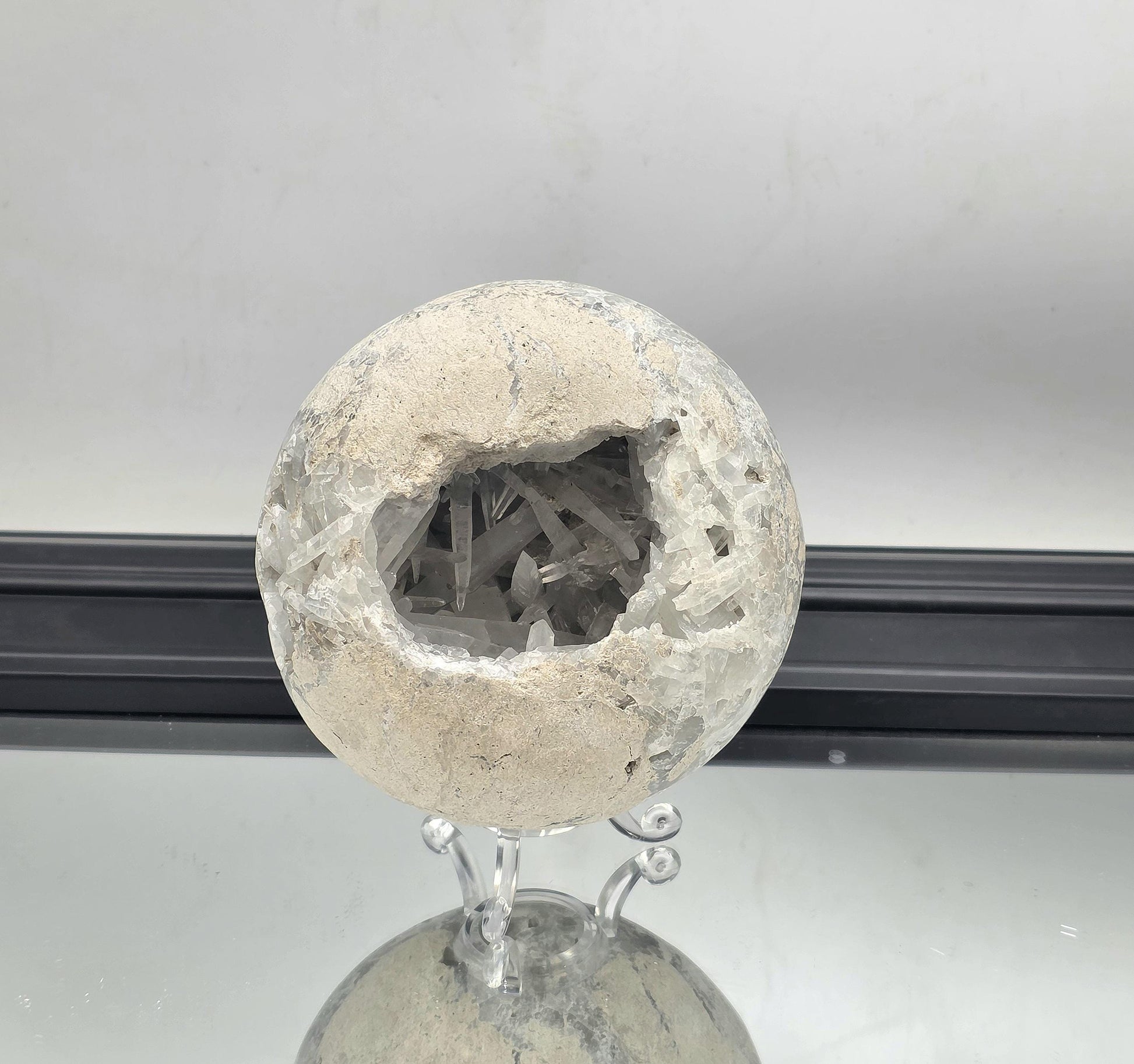 sphere with stand, showcasing brilliance