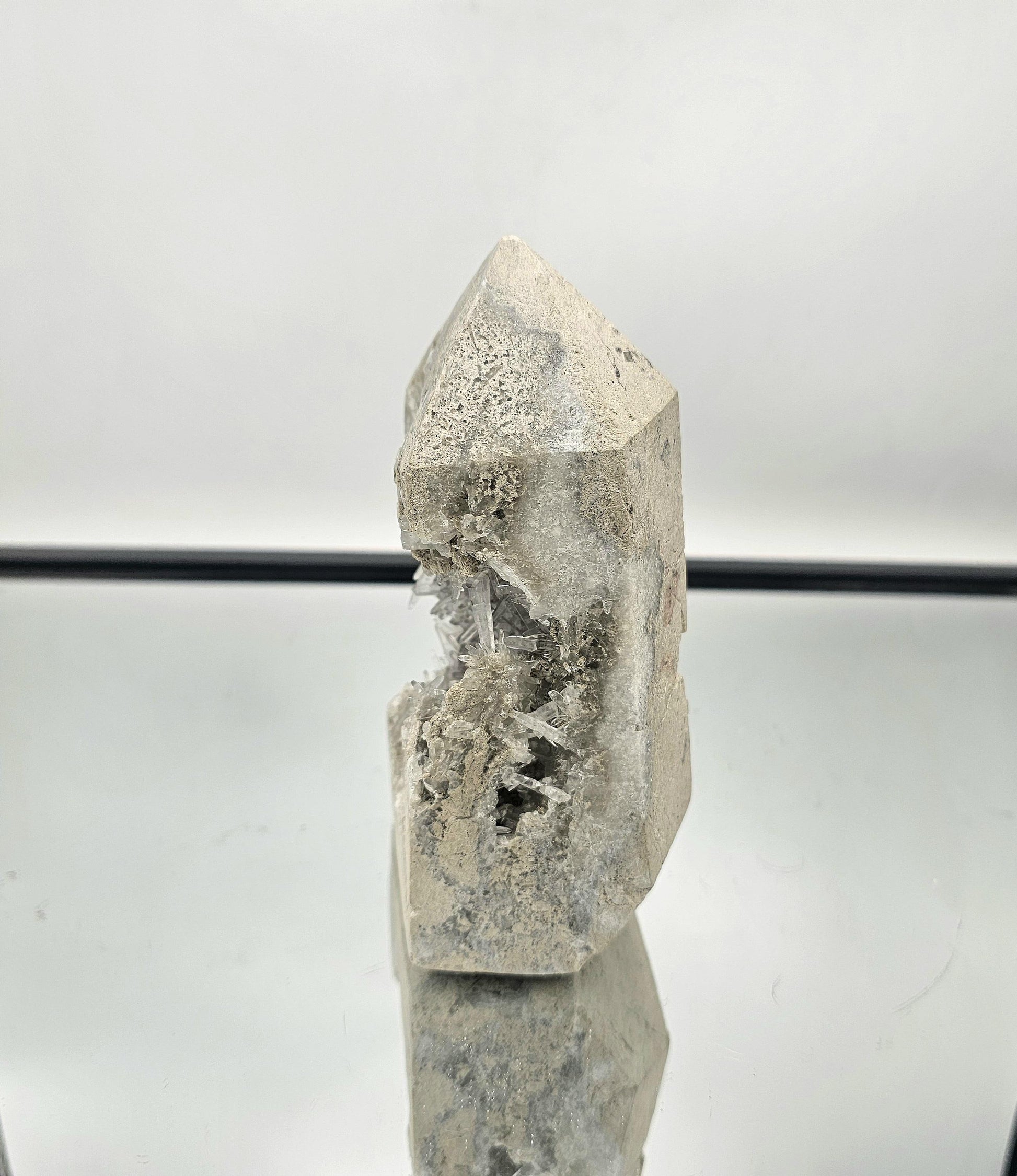 Luxurious Celestite geode prism, a rare piece featuring delicate needle crystals and beautiful blue hues.