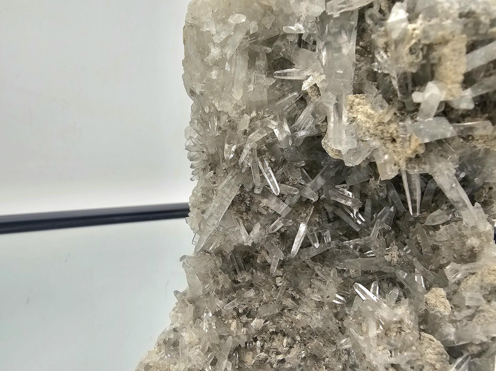 Close-up of Celestite geode prism highlighting the fine needle crystals and intricate formations.