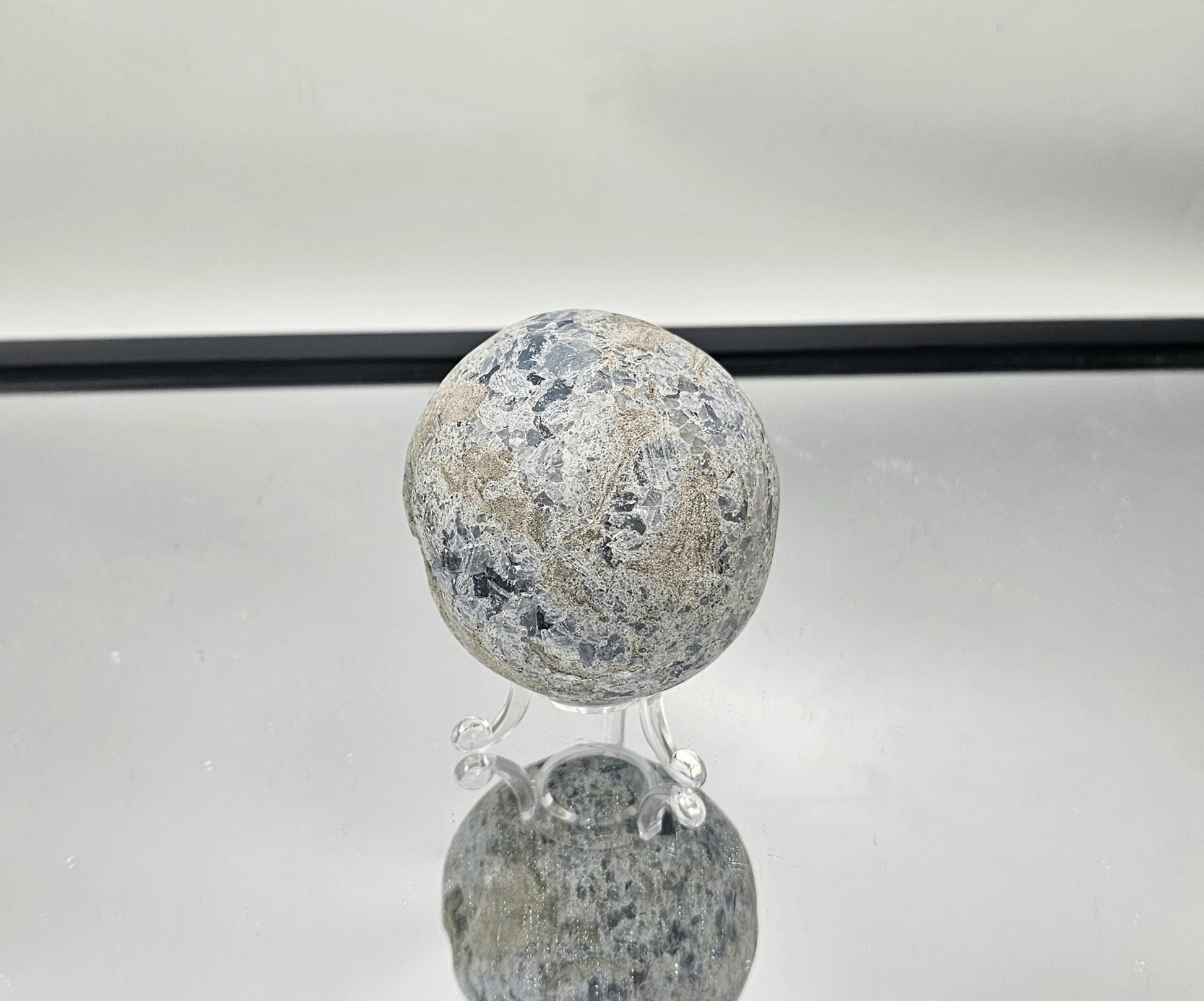  Blue Celestite Crystal sphere featuring intricate crystal clusters.