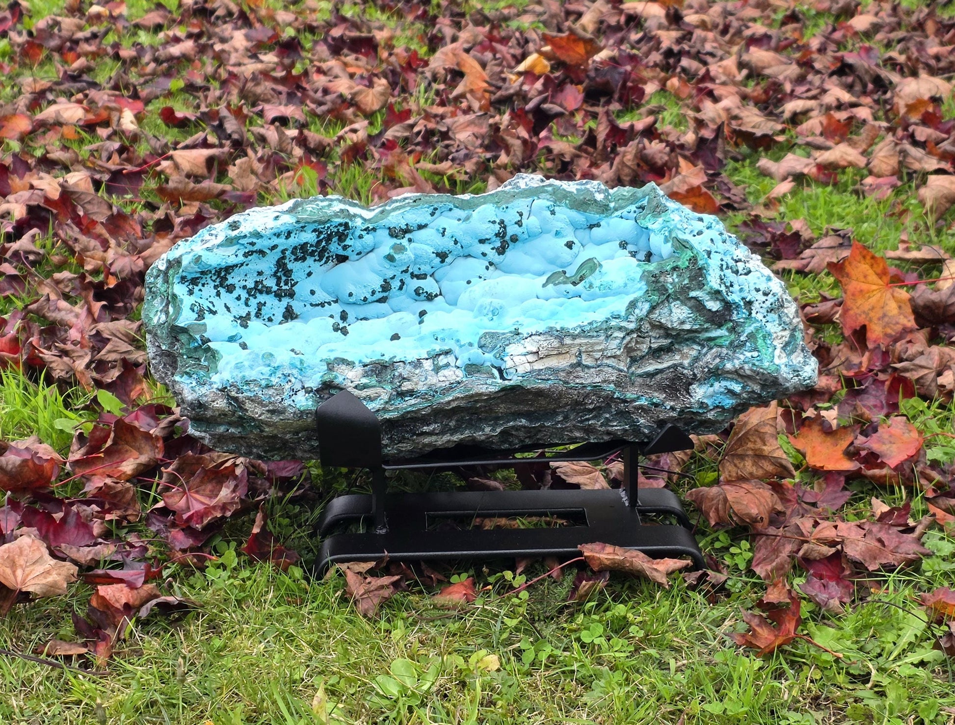 Chrysocolla and Malachite mineral specimen featuring copper inclusions.